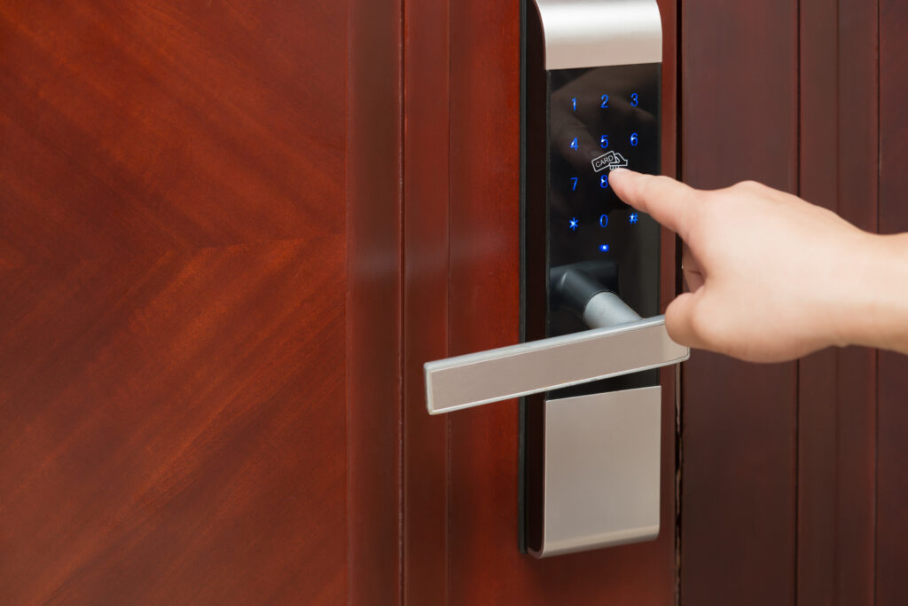 Person pressing buttons to open door