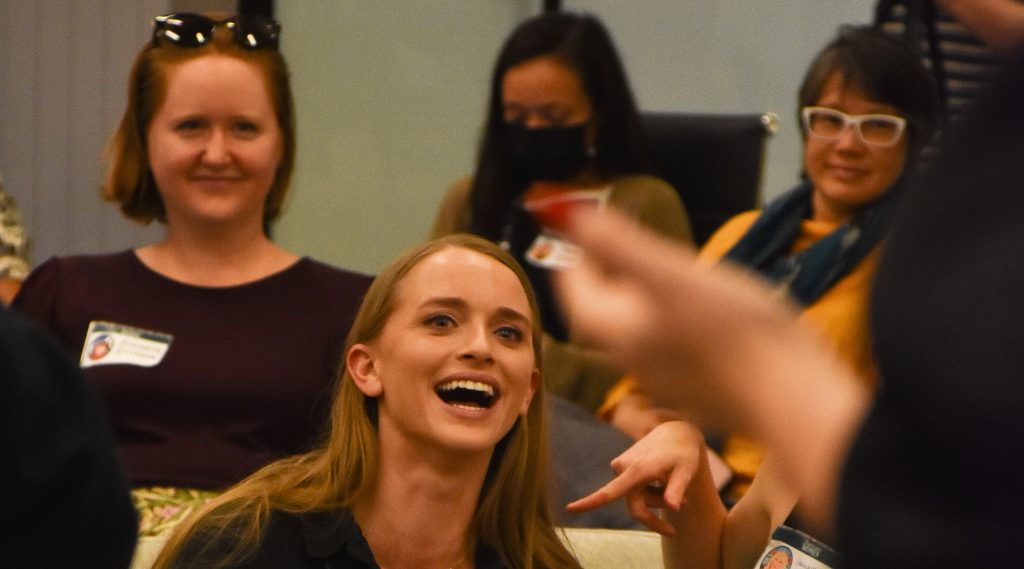 Women smiling at Marvellous Women event